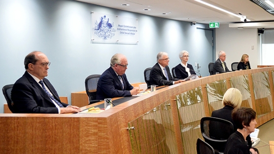 Commissioners in hearing room