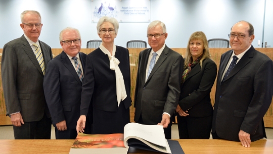 Commissioners with the Message to Australia book